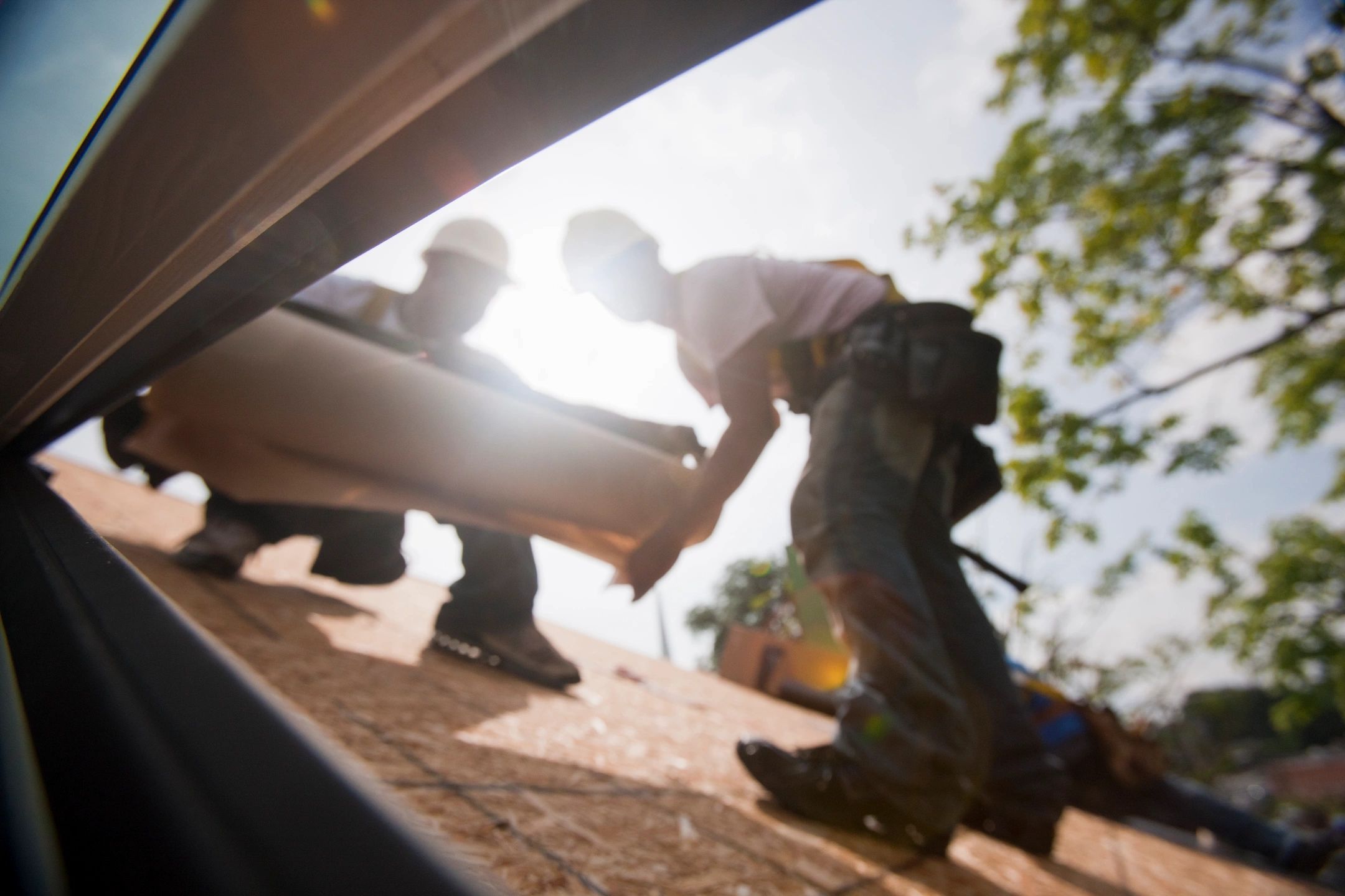 Roofing professionals at work